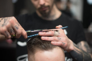 Barber giving a high fade haircut at Catch-A-Fade in Bensalem
